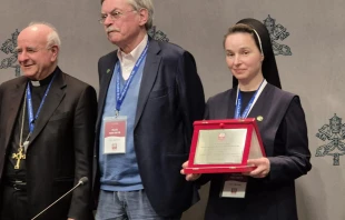 Sister Giustina Olha Holubets, SSMI, (far right) receives the “Guardian of Life” award from Archbishop Vincenzo Paglia of the Pontifical Academy for Life at a press conference in the Holy See Press Office on March 3, 2025. Credit: Hannah Brockhaus/CNA