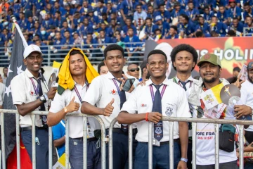 Young men attending the encounter with youth with Pope Francis at the Sir John Guise Stadium
