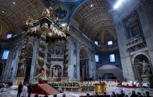 A view of St. Peter's Basilica during the Mass for the solemnity of the Immaculate Conception, with Bernini's baldachin and the papal altar decorated with white flowers, Dec. 8, 2024. Credit: Daniel Ibáñez/CNA