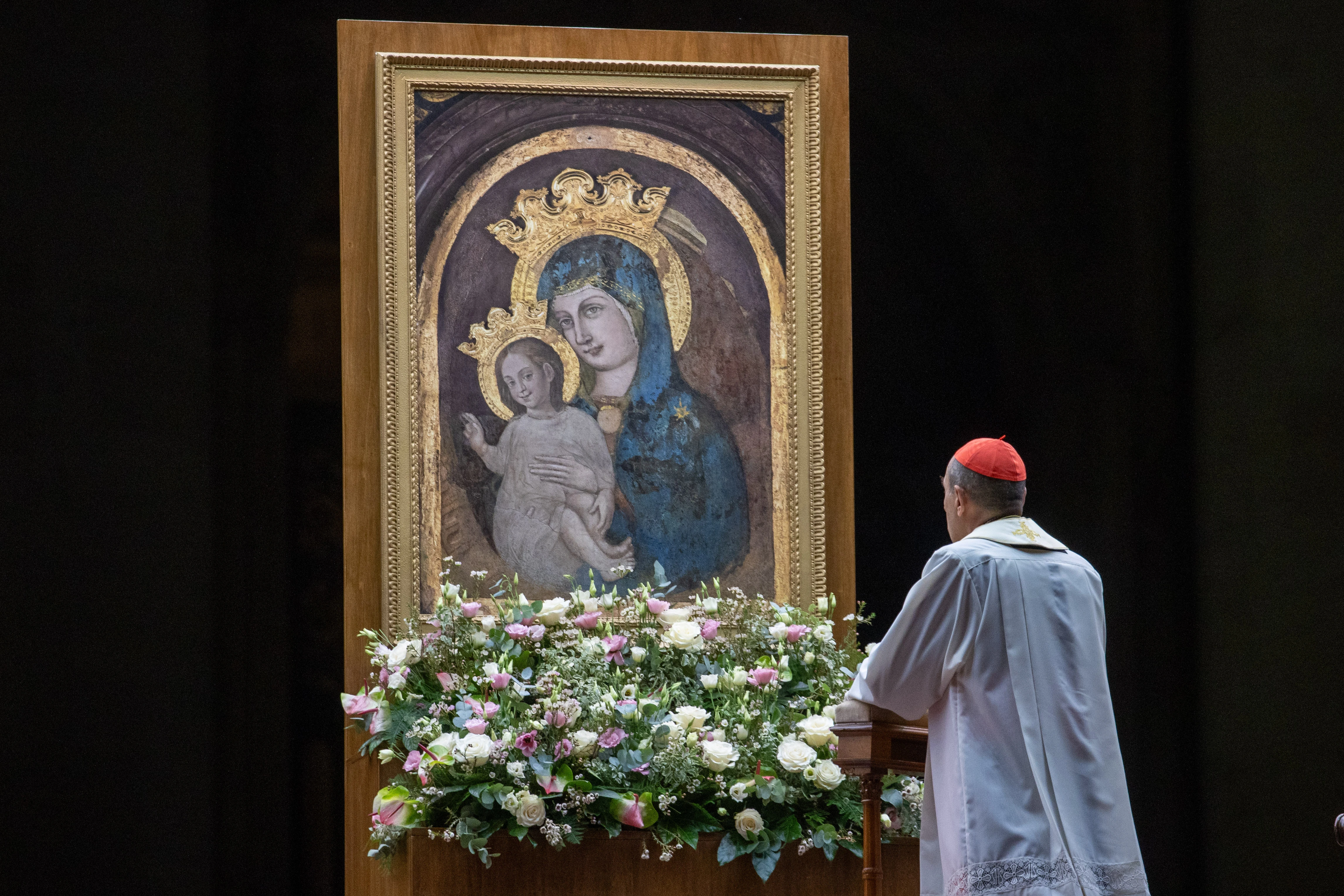 Cardinal Víctor Manuel Fernández, prefect of the Dicastery for the Doctrine of the Faith, prays before an image of the Blessed Virgin Mary and Child during the rosary vigil for Pope Francis at the Vatican on Feb. 28, 2025. Credit: Daniel Ibáñez/CNA