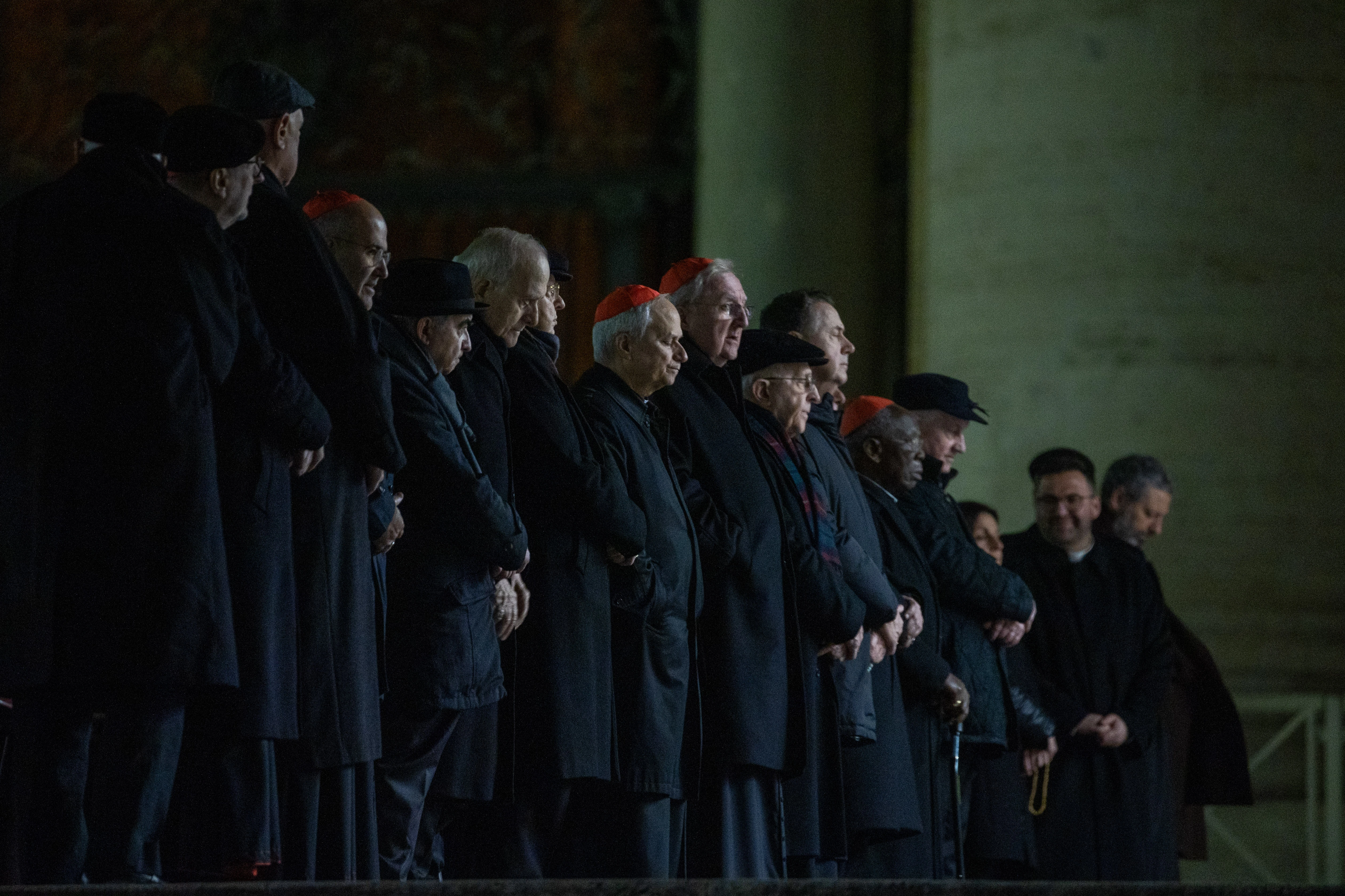 Cardinals and prelates gather in St. Peter’s Square for the evening rosary vigil, praying for Pope Francis’ recovery from his respiratory condition on Feb. 28, 2025. Credit: Daniel Ibáñez/CNA