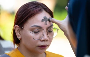 A woman receives ashes on the observance of Ash Wednesday at a church in Manila, Philippines, on March 5, 2025. The 40-day period of Lent begins for Catholics around the world on Ash Wednesday. Credit: TED ALJIBE/AFP via Getty Images