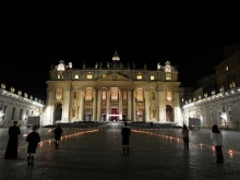 A candlelight Stations of the Cross in St. Peter’s Square on Good Friday 2021.