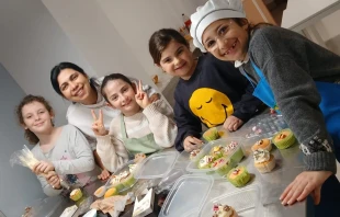 Young parishioners from the Church of St. Eugene in the Roman suburb of Parioli — Maddy (far left) and Constaza (far right) — emphasized the importance of continuing prayers for Pope Francis. The pope was discharged from Gemelli Hospital in Rome on Sunday, March 23, 2025.  Credit: Photo courtesy of Paty/Club Arcogrande
