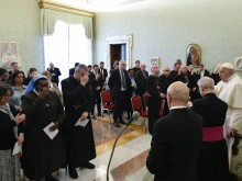 Pope Francis joins the Pontifical Commission for the Protection of Minors in prayer at the Vatican on March 7, 2024.