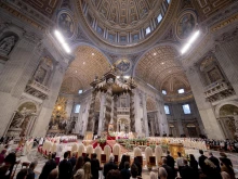 Catholics attend the Mass and episcopal ordination of two new bishops in St. Peter's Basilica Oct. 17, 2021.