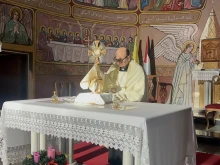 Father Gabriel Romanelli, pastor of Holy Family Parish in Gaza, leads Eucharistic adoration at the parish in December 2024.