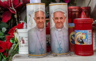 Candles with Pope Francis’ image on them stand outside Gemelli Hospital in Rome on Feb. 21, 2025. Credit: Daniel Ibañez/CNA