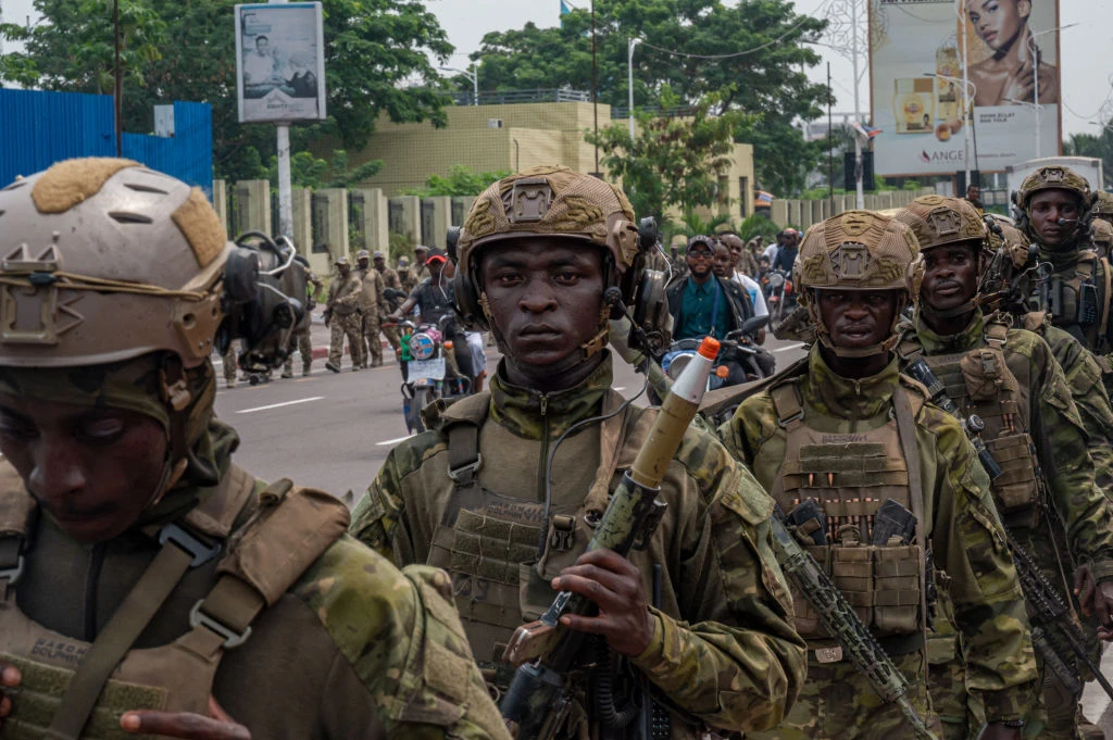 Democratic Republic of Congo Republican Guard soldiers walk in the streets of Kinshasa on March 1, 2025. As the M23 fighters continue their offensive in eastern DR Congo, hundreds of soldiers from the Republican Guard walk the streets of Kinshasa in a show of force.?w=200&h=150