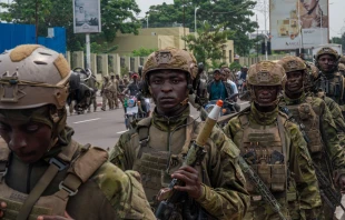Democratic Republic of Congo Republican Guard soldiers walk in the streets of Kinshasa on March 1, 2025. As the M23 fighters continue their offensive in eastern DR Congo, hundreds of soldiers from the Republican Guard walk the streets of Kinshasa in a show of force. Credit: HARDY BOPE/AFP via Getty Images