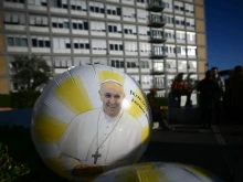 A balloon with an image of Pope Francis stands outside Gemelli Hospital in Rome, where Pope Francis is hospitalized with pneumonia. Pope Francis suffered two new breathing attacks on March 3, 2025, the Vatican said, as the 88-year-old pontiff struggles to recover from pneumonia.