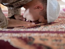 A Muslim chaplain prays during the Islamic holy month of Ramadan.