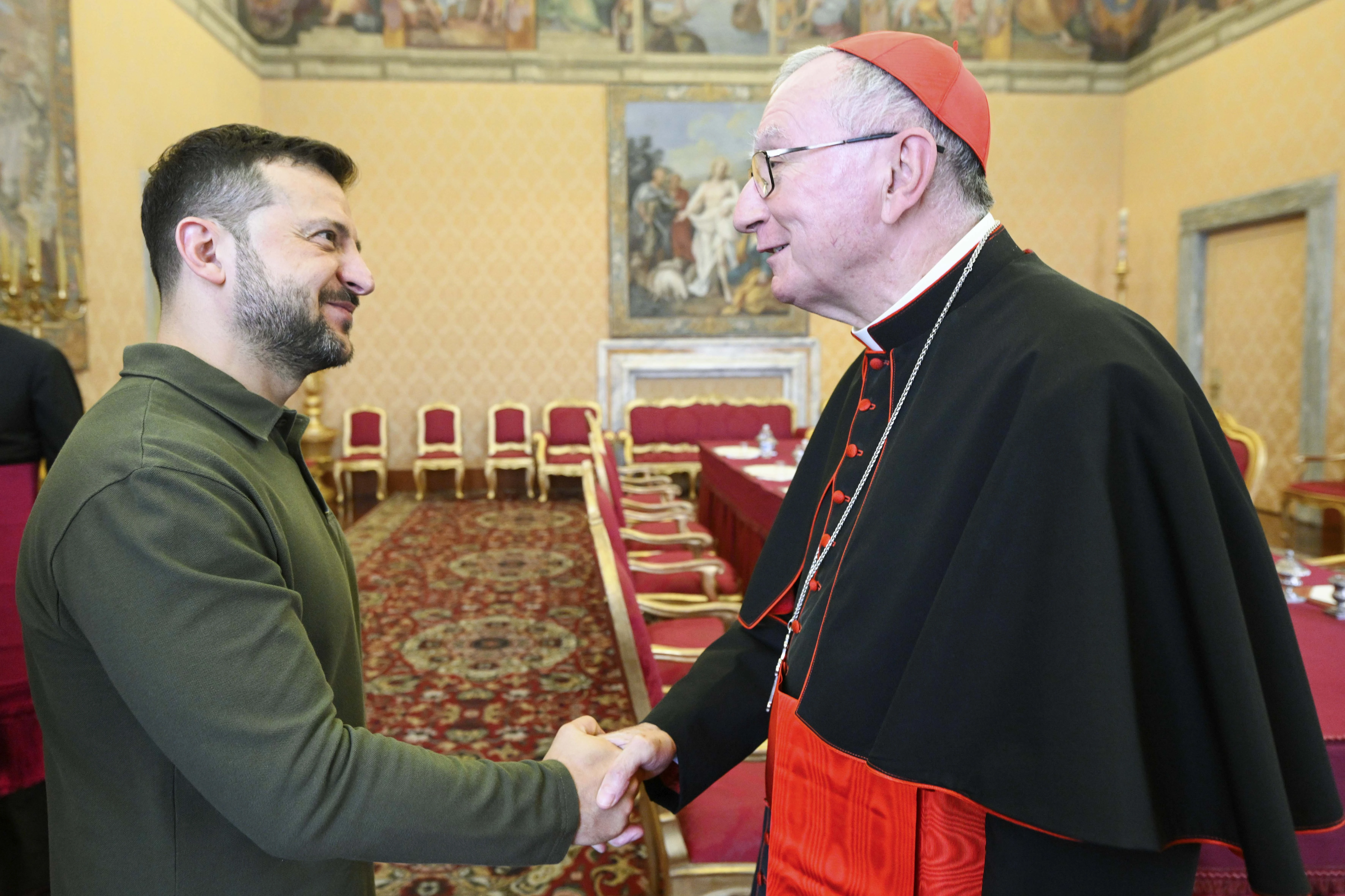 Ukraine President Volodymyr Zelenskyy shakes hands with Vatican Secretary of State Cardinal Pietro Parolin during a meeting at the Vatican on Friday, Oct. 11, 2024.?w=200&h=150