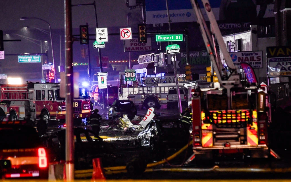 Emergency service members respond to a plane crash in a neighborhood near Cottman Avenue on Jan. 31, 2025, in Philadelphia. The plane, a medical transport jet carrying a child patient, crashed after taking off from Northeast Philadelphia Airport.?w=200&h=150