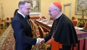 Vatican Secretary of State Cardinal Pietro Parolin (right) meets with Polish President Andrzej Duda on March 28, 2025, at the Vatican. 
