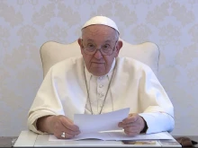 Pope Francis delivers a video message to participants in the 53rd International Eucharistic Congress, taking place in Quito, Ecuador, Sept. 8-15, 2024. The Eucharist teaches us how to have, the pope said in his message recorded at the Vatican, "a profound brotherhood, born of union with God..."