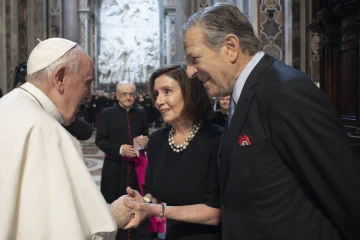 Pope Francis speaks to House Speaker Nancy Pelosi and Paul Pelosi on June 29, 2022.