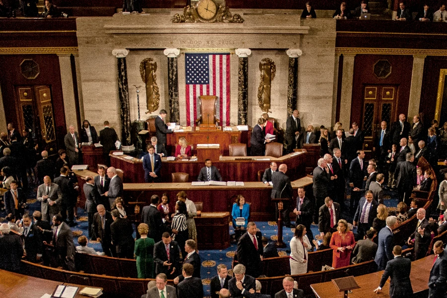 Members and guests on the floor of the House during a joint session of Congress.?w=200&h=150