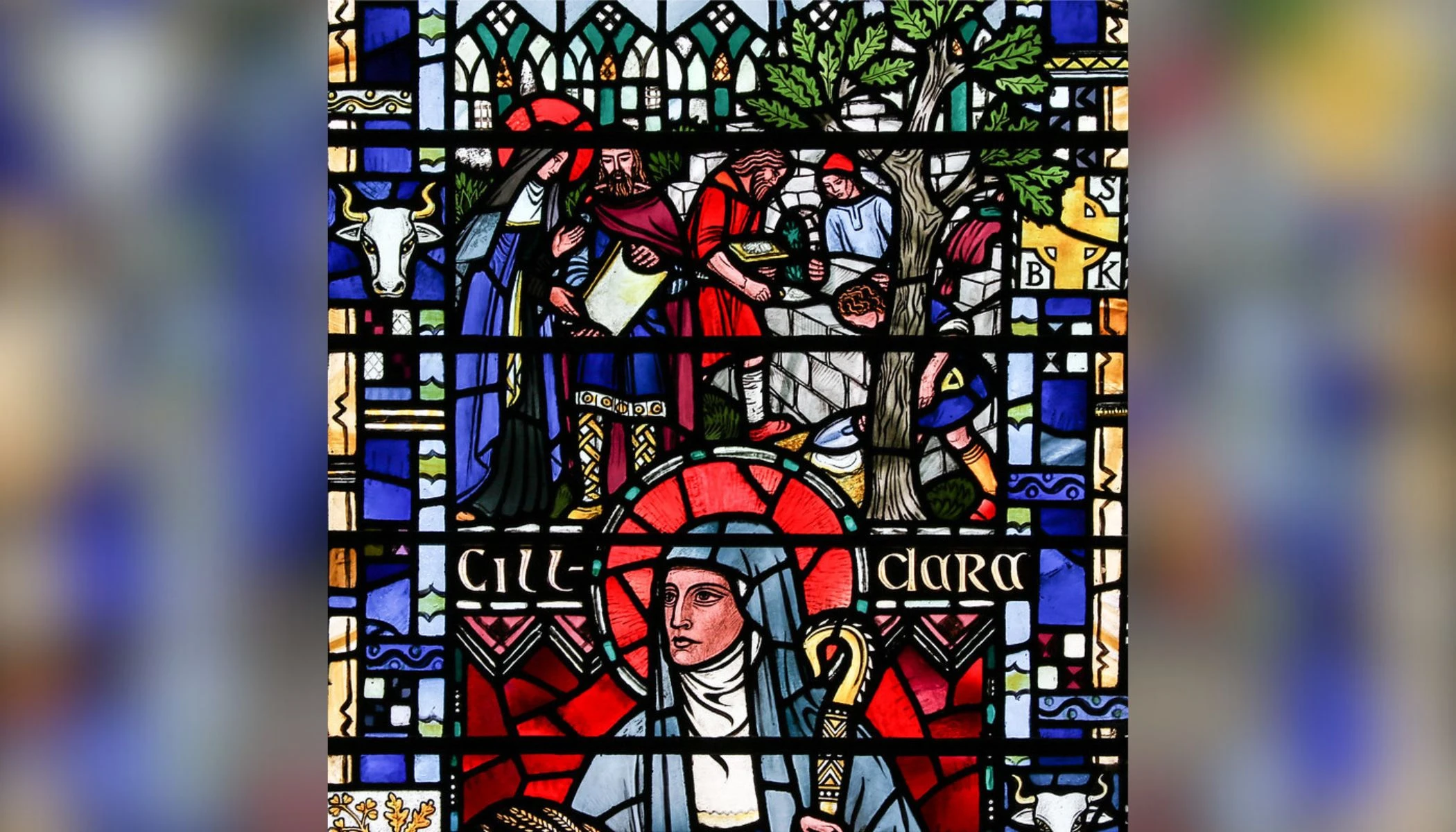 St. Brigid of Kildare building the Church of the Oak, detail from a window of St. Etheldreda’s Church in London.?w=200&h=150