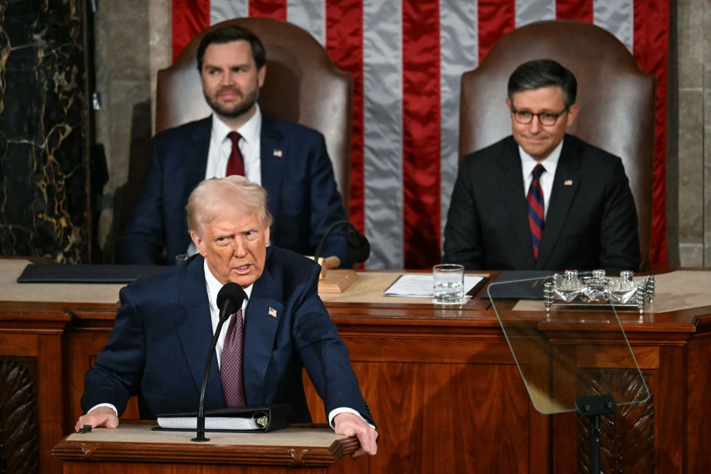 U.S. President Donald Trump addresses a joint session of Congress in the House Chamber of the U.S. Capitol in Washington, D.C., on March 4, 2025, as Vice Preseident JD Vance (back left) and Speaker of the House Mike Johnson (back right) look on.?w=200&h=150