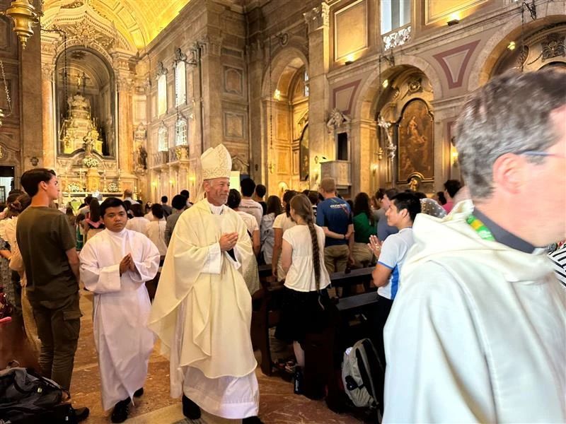 Archbishop Alexander Sample of Portland, Oregon, processes out of the Church of Our Lady of Providence after Mass during a Rise Up Encounter of World Youth Day in Lisbon, Portugal, on Aug. 4, 2023.?w=200&h=150
