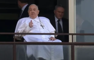 Pope Francis gives a thumbsup gesture from his window at Gemelli Hospital in Rome during his first public appearance in weeks on Sunday, March 23, 2025. Credit: Screenshot/Vatican Media